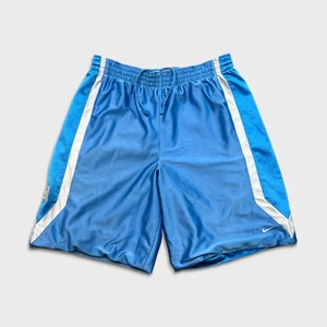 Pantaloni sportivi Nike Sportswear corti uomo grandi blu swoosh reversibili basket atletici - Foto 1 di 12