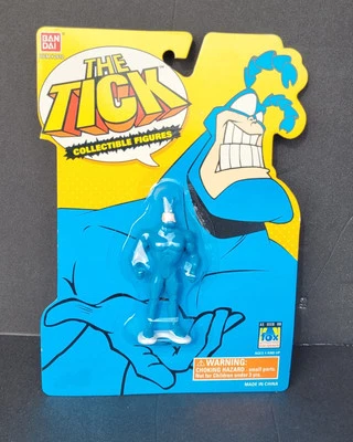 The TICK Bandai 1994 cómic programa de televisión superhéroe pequeño figura de 3" sin usar, en caja Foto 1 de 3