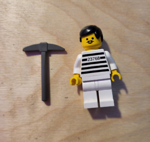 Lego Prisoner minifigure number 23768, with gray pickaxe accessory