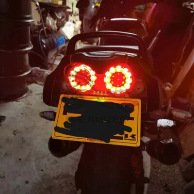 Universal Motorcycle LED Dual Brake Turn Signal Tail Lights For Honda Suzuki - Image 1 of 4