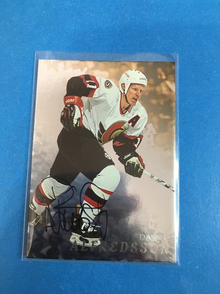Autógrafos F145.319 1998-99 Be A Player #98 Daniel Alfredsson  - Imagem 1 de 1
