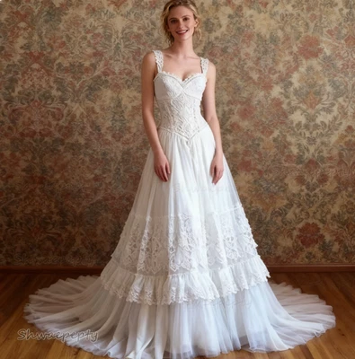 Vestidos de novia Victoria blancos marfil con tirantes apliques de encaje vestidos de novia Foto 1 de 4