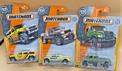 Matchbox 65th Anniversary Long Card Bundle Hummer Concept, Badlander, Int’l CXT - Image 1 of 4