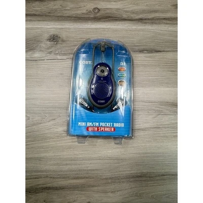 NIP COBY CX-8 Blue Mini AM FM Pocket Radio with Speaker and Earphones - Image 1 of 3