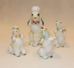 Lot of 4 Miniatures Poodle Puppy Dog Figurines Porcelain 2 1/2" Tall - Picture 1 of 3