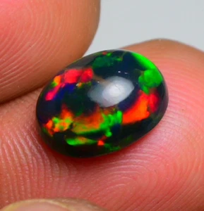 Black Opal Cabochon Oval 2.70 Cts , Stunning Play of Color! Perfect for Jewelry - Picture 1 of 13
