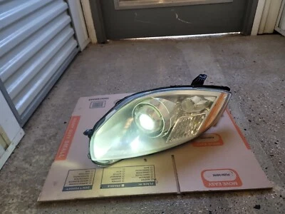 Conjunto de faros de xenón HID lado izquierdo/del conductor Mitsubishi Eclipse 2009-2012 OEM Foto 1 de 4