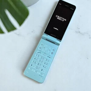 KYOCERA KYF42 GRATINA WIFI ANDROID FLIP PHONE UNLOCKED JAPAN Light blue - Afbeelding 1 van 7
