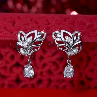 18k white gold gp crystal huggies pear drop dangle flower feather wings earrings - Imagem 1 de 4