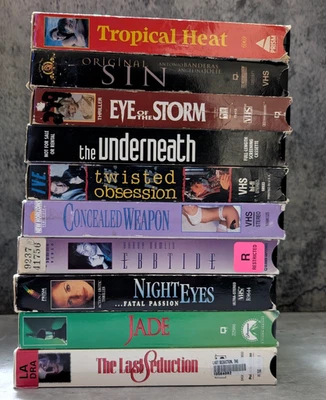 Erotic thriller VHS lot. Night Eyes 4, Tropical Heat, Jade, Concealed Weapon - Image 1 of 4