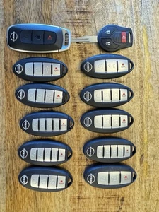 LOT OF 12 OEM  NISSAN SMART  KEY FOB  KEYLESS ENTRY FOB Used - Picture 1 of 4