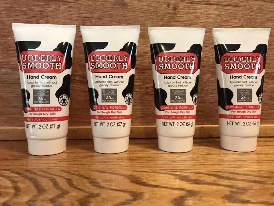 Paquete de 4 lociones hidratantes crema de manos UDDERLY SMOOTH 2 OZ "Para piel seca áspera" Foto 1 de 1