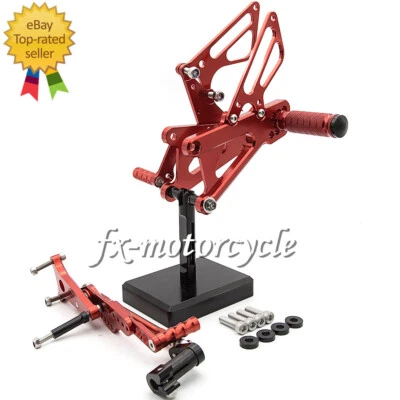 Juego de estriberas traseras CNC rojo cambio para Triumph Street Triple 765 2019-2022 Foto 1 de 4