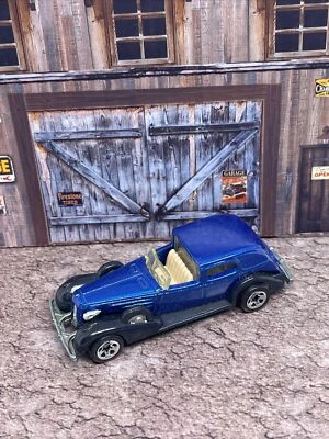 Coche deportivo Caddy clásico Mattel Hot Wheels 1981 azul '35 Cadillac Foto 1 de 4