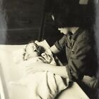 Vintage Black and White Photo Young Woman Calming Crying Infant Baby Crib