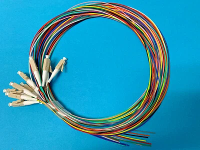 12 Optic Fiber Pigtail, Color-Coded, MMF OM3, LC/UPC, 900um, 3 Meter, Unjacketed - Image 1 of 4