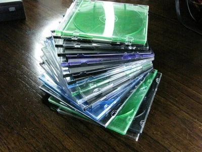 Caja de almacenamiento de disco CD DVD individual color mezclado 15x delgada joya - HACER OFERTAS Foto 1 de 4