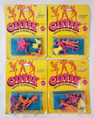 Minifiguras de juguete de plástico C.U.T.I.E 1986 4 paquetes de 4 Cutie Mattel nuevas sin abrir Foto 1 de 4