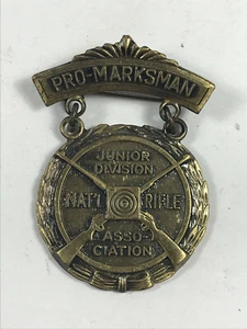 De colección NRA Pro-Marksman Junior Division Premio Medalla Prendedor Cinta Insignia - Imagen 1 de 2