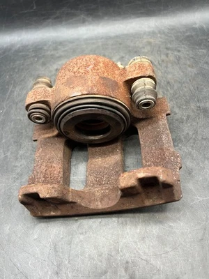 Conjunto de pinza de freno de disco delantera Jeep Wrangler Grand Cherokee OEM 120742 Foto 1 de 4