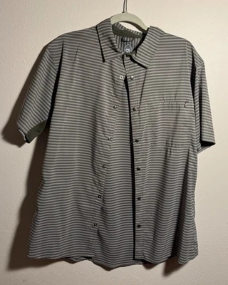 Camiseta técnica grande Club Ride con botones a presión para hombre, ropa técnica de ciclismo Foto 1 de 3