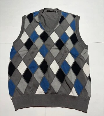 Chaleco Suéter Greg Norman Talla Grande Gris Con Azul Blanco y Negro Argyle Foto 1 de 4