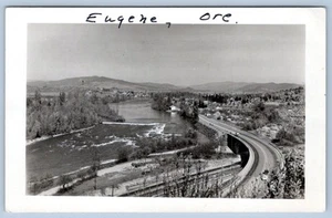 1940's RPPC EUGENE OREGON AERIAL VIEW HIGHWAY OVERPASS RIVER REAL PHOTO POSTCARD - Picture 1 of 2