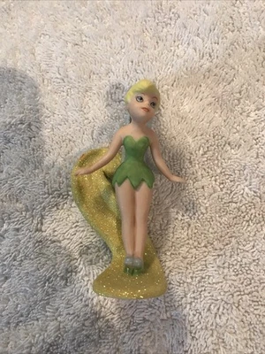 Vintage  disney ceramic figurines Tinkerbell riding a yellow Wave 4 Inches Tall - Image 1 of 4