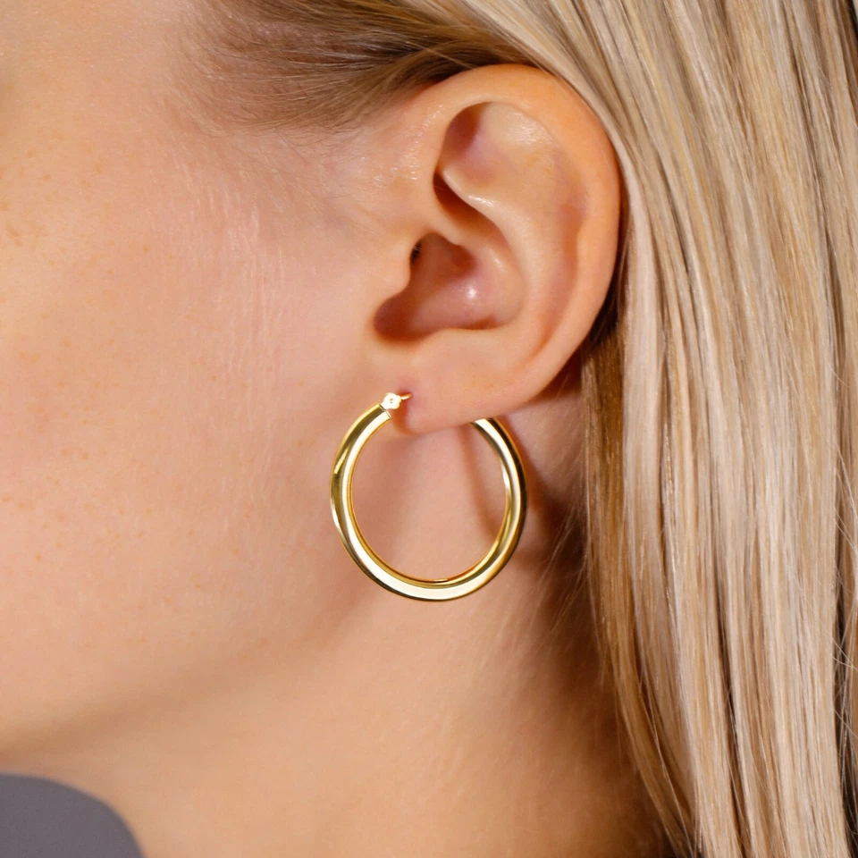 Pendientes de aro criollos gruesos de tubo plano pulido brillante de oro amarillo sólido real de 14K Foto 1 de 4