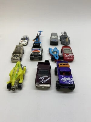Lot of 11 Matchbox hotwheels die cast toy cars vintage dinosaur disney cars - Image 1 of 4