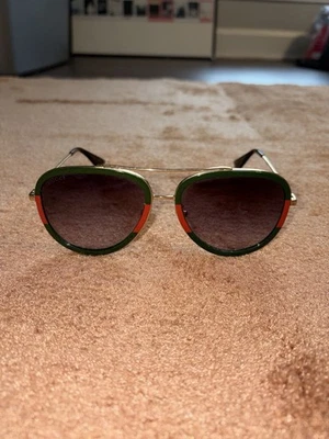 Gafas de sol Gucci GG0062S 003 57 mm verde aviador/rojo con lente gris claro Foto 1 de 4