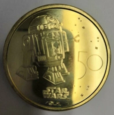 Disney 50th Anniversary R2D2 Coin Medallion In Hand - Image 1 of 2