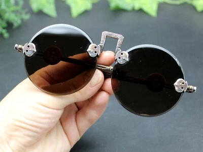 Antigua estatua de gafas de sol chinas redondas hechas a mano con espejo Foto 1 de 4