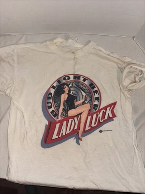 Vintage Single Stitch Bud cerveza ligera dama suerte blanco talla X grande 1990 Foto 1 de 4