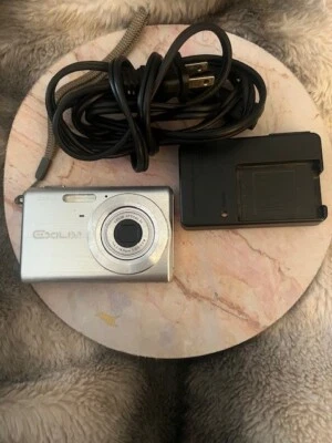 Casio Exilim EX-Z60 Digital Camera With OEM Battery And Charger - Image 1 of 4