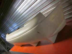 Fiberglass NMS Style Rear Bumper for a 93-97 Mazda 626 4DR - Picture 1 of 9