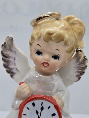 Vintage Angel Japan January Ceramic Figure Holding Clock Figurine - Image 1 of 4