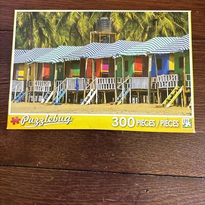 Puzzlebug 300 Pc Jigsaw Puzzle : Huts On Sandy Beach (Factory Sealed) - Image 1 of 4