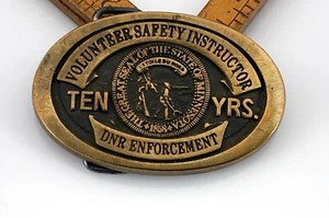 Hebilla de cinturón de cumplimiento de DNR de instructor de seguridad voluntario 10 años - Imagen 1 de 2