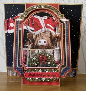 Tarjeta de Navidad hecha a mano con temática de vaca Highland frontal corte 7"x7" - Highland Greetings - Imagen 1 de 5