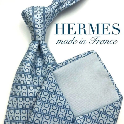 Corbata HERMES patrón geométrico borde azul claro Foto 1 de 4