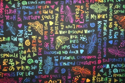 KINDRED CANINES BY LAUREL BURCH - MULTICOLORED WORDS AND FLUTTERBYES ON BLACK - Image 1 of 3