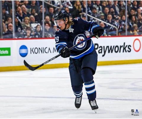 Patrik Laine Winnipeg Jets Unsigned Blue Jersey Shooting Photo Cover