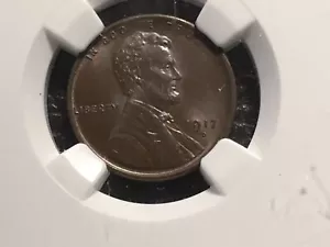 1917 d lincoln cent NGC 64 unc. brown case a little scratched - Picture 1 of 5