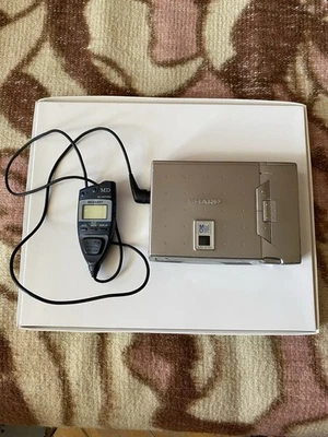 SHARP MD-S70H - Rare - Lecteur Minidisc Portable Old School - Son de haute... - Photo 1/4