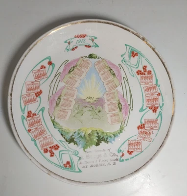 Placa de calendario Mt Morris NY antigua 1911 1912 publicidad de sombrerería M Beggs & Co Foto 1 de 4