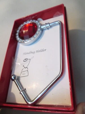 GANCHO MONEDERO JOYA ROJA EN CAJA Foto 1 de 2