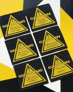 Advertencia coser etiquetas para trajes extra calientes - Imagen 1 de 8