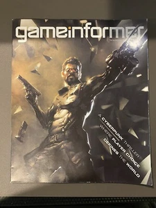 GAME INFORMER Magazine #265 May 2015 DEUS EX: Mankind Divided - Picture 1 of 2