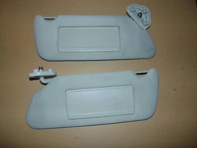 Hummer H3 2006-2010 pasajero derecho conductor izquierdo parasol conjunto bronceado Foto 1 de 3